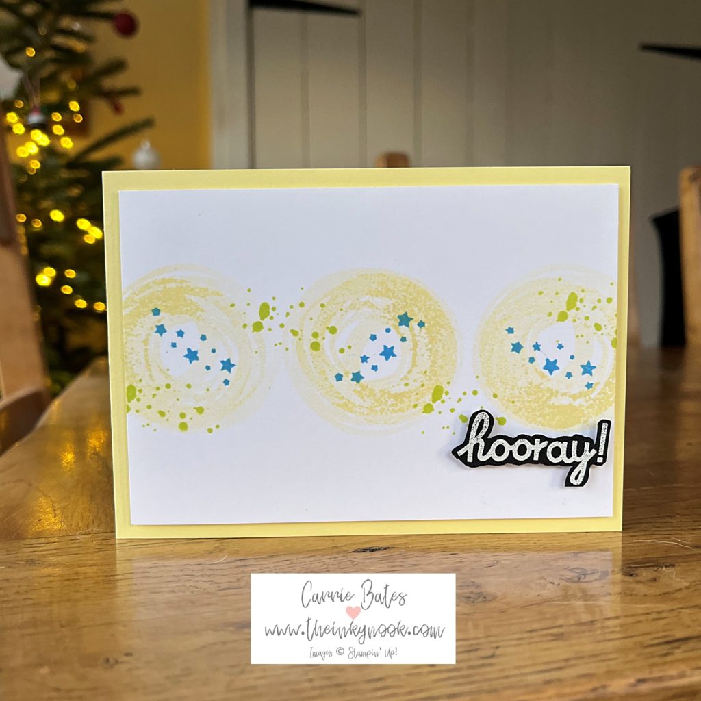 Simple teenager birthday card with a soft yellow card base topped with a white layer. The white layer has 3 yellow circles across the middle, with 3 blue star rows and some random light green ink splodges
