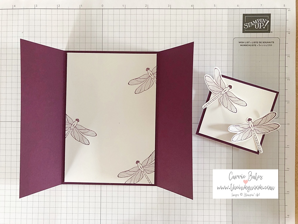 Purple card topped with purple dandelion paper and a sliding topper with dragonflies on top for my parents wedding anniversary card.