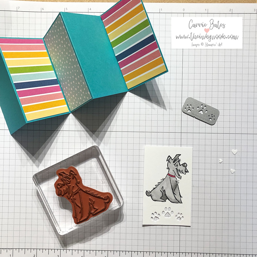 How to make a card in a box - folding card with rainbow papers and front layer has a grey dog 