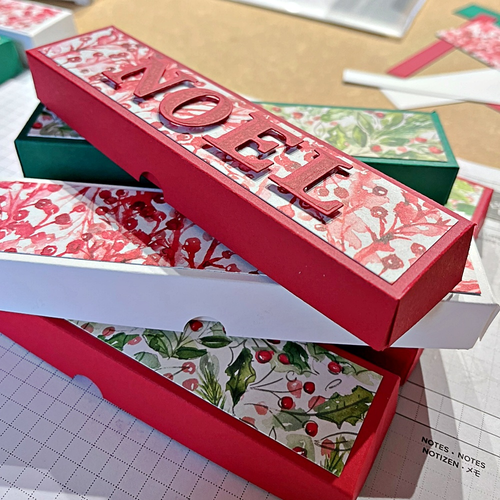 Personalised tealight holder in red, green and white decorated with Christmas holly leave inspire papers 