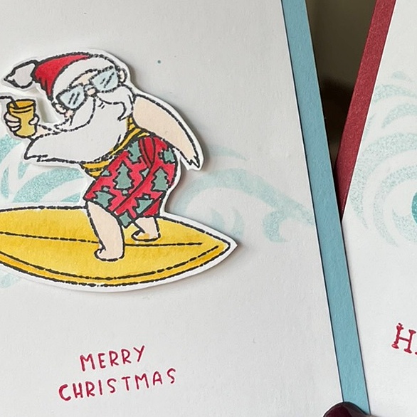 Make this Surfing Santa fun Christmas card and get colouring